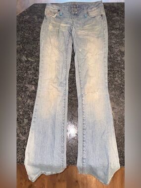 Women's Light Blue Flare Jeans - Classic Distressed